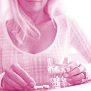 Woman taking medication