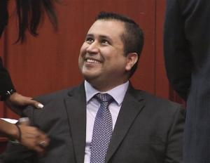 George Zimmerman smiles after verdict