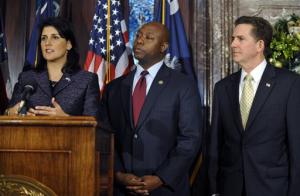 South Carolina Gov. Nikki Haley, left. U.S. Rep Tim Scott, center. U.S. senator as Sen. Jim DeMint, right.