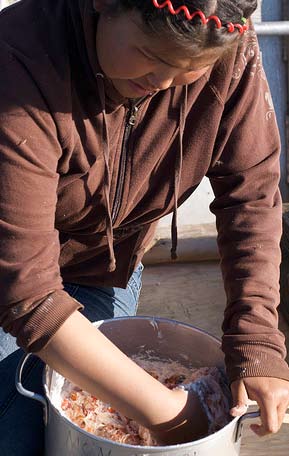 An Inuit preparing Akutaq