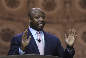 In this March 16, 2014, file photo, Sen. Tim Scott, R-S.C. speaks at the Conservative Political Action Committee annual conference in National Harbor, Md. There are at least 25 African-Americans running for statewide offices including U.S. senator, governor or lieutenant governor, also a record number. Those statewide numbers include Democrat Cory Booker of New Jersey and Scott, the U.S. Senate's only black members.