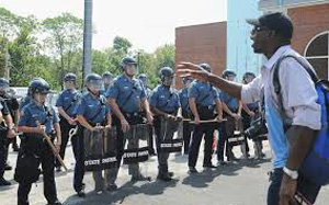 All the police officers in this predominantly black suburb of St. Louis, Missouri are white.