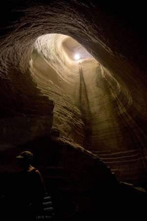 Saam Gabbay of the U.S. visits the Maze Cave of Beit Guvrin-Maresha, central Israel, Tuesday, June 24, 2014. UNESCO added the caves of Beit Guvrin-Maresha — known as a &quot;city under a city&quot; -- to the prestigious list of World Heritage sites during its annual meeting in Qatar on Sunday.