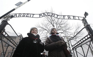 Holocaust survivors arrive for a ceremony to mark the 69th anniversary of the liberation of Auschwitz Nazi death camp in Oswiecim, Poland, on Monday, Jan. 27, 2014, since the Soviet Red Army liberated the camp.