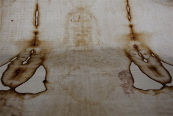 This Thursday, Sept. 30, 2010 file photo shows a replica of the Shroud of Turin, which some believe is Jesus Christ's burial cloth, at a church in Beirut, Lebanon. The cloth bears the figure of a crucified man, complete with blood seeping from his hands and feet, and believers say Christ's image was recorded on the linen's fibers at the time of his resurrection.