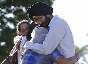 Sikh's console each other after shooting.