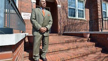 St. Paul’s College President Millard “Pete” Stith stands outside one of the 35 buildings for sale on the Lawrenceville, Va., campus of the historically black college and university on March 26, 2014. The college closed in 2013 under mounting debt and a loss of accreditation. Smith and St. Paul’s alumni are hopeful an April 9 sale will resurrect the school, founded in 1888.