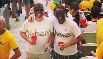 The World Cup highlights the racism issues that pervade Brazil. Shown here are two fans in black face.