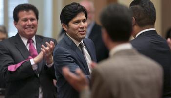 Senator Kevin de Leon, Democrat from Los Angeles, second from left, receives congratulations from other lawmakers after he was elected as the new Senate President Pro Tem at the Capitol in Sacramento, Calif., Monday, June 16, 2014. De Leon will become just the second Latino leader of the Senate, but the first in more than 130 years.