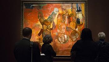 In this photo taken Nov. 6, 2014, members of the media tour the Bill and Camille Cosby collection at the Smithsonian's National Museum of African Art in Washington. The Smithsonian Institution is mounting a major showcase of African-American art and African art together in a new exhibit featuring the extensive art collection of Bill and Camille Cosby.