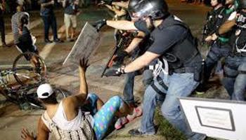 Ferguson and St. Louis County employed military gear in addition to many police officers during the protests over Michael Brown’s death.