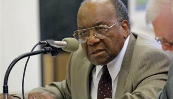 In this March 9, 2011 photograph, Senate Rules Committee member David Jordan, D-Greenwood, votes against a proposed substitute Senate Redistricting plan at the state Capitol in Jackson, Miss. The veteran lawmaker has recently penned a memoir that documents changes in the state's race relations and changes in voting rights over his lifetime.