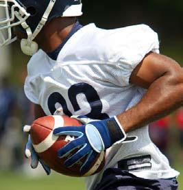 football player running with ball