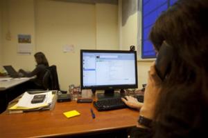 In this file photo taken Dec. 16, 2010, Israeli project manager Gali Kahane sits in front of a computer in the office of Comply, an Israeli start-up that employs Palestinians, in Hod Hasharon, near Tel Aviv. Israel’s flourishing tech industry, where major global companies have offices and startups abound, has earned the country the nickname "Startup Nation."