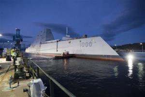 In this image provided by the U.S. Navy the Zumwalt-class guided-missile destroyer DDG 1000 is floated out of dry dock at the General Dynamics Bath Iron Works shipyard Oct. 28, 2013. The ship that bears his name, the first of three Zumwalt-class destroyers, was christened by Zumwalt's two daughters on Saturday April 12, 2014 at Bath Iron Works.