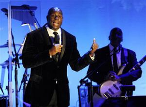 In this Oct. 11, 2014, file photo, Earvin "Magic" Johnson addresses the audience after receiving the Brass Ring Award for his humanitarian efforts at the 2014 Carousel of Hope Ball at the Beverly Hilton Hotel in Beverly Hills, Calif. Now, as an entrepreneur focused on minority markets, he says he is ready to help Silicon Valley hire more blacks and Latinos to diversify the technology industry's largely white and Asian workforce.