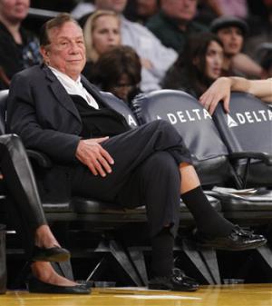 In this Monday, Dec. 19, 2010 photo, Los Angeles Clippers owner Donald Sterling watches the second half of an NBA preseason basketball game between the Los Angeles Clippers and the Los Angeles Lakers. On Saturday, April 26, 2014, the NBA said it is investigating a report of an audio recording in which a man purported to be Sterling makes racist remarks while speaking to his girlfriend.