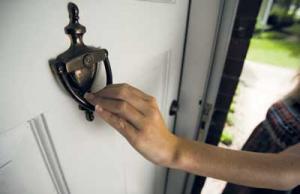 hand on door knocker