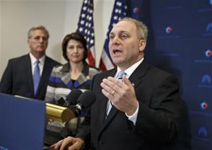 In this Nov. 18, 2014 file photo, House Majority Whip Steve Scalise of Louisiana, right, with House Majority Leader Kevin McCarthy of Calif., left, and Rep. Cathy McMorris Rodgers, R-Wash., speaks to reporters on Capitol Hill in Washington, following a House GOP caucus meeting. Scalise acknowledged that he once addressed a gathering of white supremacists. Now he is the third-highest ranked House Republican in Washington.