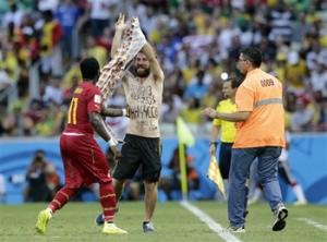 The man who invaded the pitch during the Germany-Ghana match at the World Cup was a neo-Nazi sympathizer, according to a report that will be delivered to FIFA on Monday.