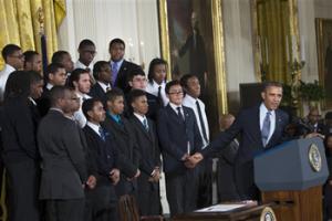 President Barack Obama, joined at the White House by young men of color, called on America's businesses, philanthropists and government leaders to join forces to put more boys on a path toward successful lives. Foundations were to announce pledges to spend at least $200 million over five years to promote that goal as Obama launches his "My Brother's Keeper" initiative.