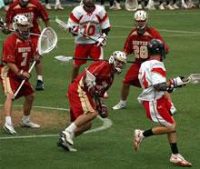 two teams playing lacrosse