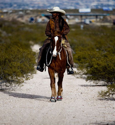 Miles Dean: modern African-American cowboy riding horse