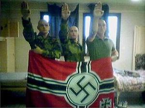 Nazi flag soldiers are sought by French authorities after a string of recent murders, including the attack in Toulouse where 4 people were killed at a Jewish school.