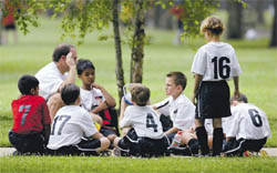 Children playing soccer