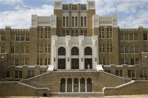 On Monday, Jan. 13, 2014, a man walks on the stairs at Little Rock Central High School in Little Rock, Ark., which gained national attention in 1957 when blacks, who became known as the &quot;Little Rock Nine&quot;, made the first steps to integrate the school and met tremendous resistance led by then Governor Orval Faubus and the National Guard.