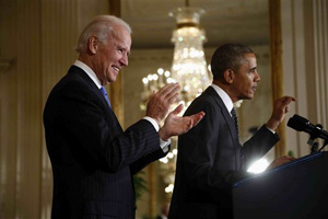 Vice President Joe Biden applauds as President Barack Obama speaks about immigration reform, Thursday, Oct. 24, 2013, in the East Room of the White House in Washington. The president said now that the partial government shutdown is over, Republicans and Democrats should be able to work together to fix what he called &quot;a broken immigration system.&quot;