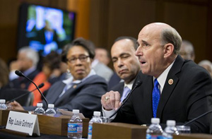 From left, Rep. Marcia Fudge, D-Ohio, Rep. Luis Gutierrez, D-Ill., and Rep. Louie Gohmert, R-Texas, testify on Capitol Hill in Washington, Tuesday, Oct. 29, 2013, before a Senate Judiciary subcommittee hearing on so-called &quot;stand your ground laws.&quot;