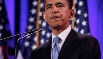 President Barack Obama standing at a podium