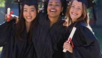 female graduates in robes and mortar boards