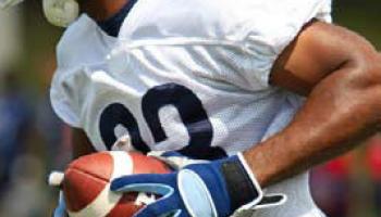 football player running with ball