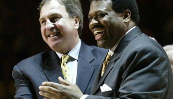 In this Feb. 13, 2007 file photo, former Tennessee basketball players Bernard King, right, and Ernie Grunfeld, laugh during a ceremony to retire King's #53 jersey during halftime of the Tennessee-Kentucky game in Knoxville, Tenn. In an ESPN "30 For 30" documentary airing Tuesday, Nov. 5, 2013, about the friendship between King and Grunfeld, King publicly discusses for the first time incidents of racism he says he encountered while in college.