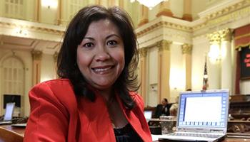 In this Aug. 28, 2014 file photo, California state Sen. Norma Torres, D-Pomona, poses in the Senate Chambers at the Capitol in Sacramento. Torres, a first-time candidate for Congress, tells voters there is no more critical time to vote than now _ even as she accepts that “great disillusion” might prompt many Hispanic voters to sit this non-presidential midterm election out.