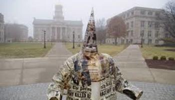This KKK statue as an art form was displayed on the campus of the University of Iowa by a visiting professor and incited a strong reaction from black students.