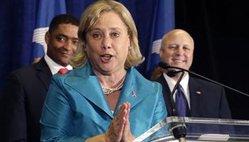 In this Oct. 20, 2014, photo, Sen. Mary Landrieu, D-La., speaks at a campaign event for her senate race in Baton Rouge, La. Landrieu said Monday, Oct. 27, 2014, that she is "not backing up" from President Barack Obama, but she also insisted that she had a record of bipartisanship during Louisiana's latest Senate race debate.