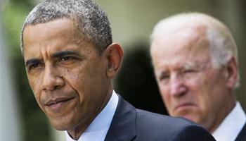In this June 30, 2014, file photo, President Barack Obama, accompanied by Vice President Joe Biden, pauses while making a statement about immigration reform, in the Rose Garden of the White House in Washington. Obama over time has been embraced and scorned by immigrant advocates who have viewed him as both a champion and an obstacle to their cause.