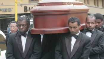 Black pallbearers in Peru