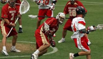 two teams playing lacrosse