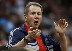 In this April 26, 2014, file photo, Atlanta Hawks co-owner Bruce Levenson cheers from the stands in the second half of Game 4 of an NBA basketball first-round playoff series against the Indiana Pacers in Atlanta. Levenson said Sunday, Sept. 7, 2014, he is selling his controlling interest in the team, in part due to an inflammatory email he said he wrote in an attempt "to bridge Atlanta's racial sports divide."