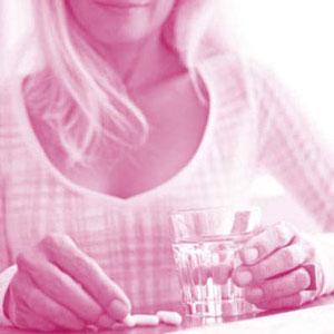 Woman taking medication