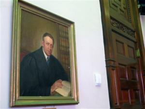 A painting of U.S. District Judge Waites Waring, one of three federal judges to hear a key school desegregation case from Clarendon County, S.C., in 1951, hangs in the courtroom where the case was again heard in the federal courthouse in Charleston, S.C., on April 3, 2014. Waring was the first judge to write an opinion that separate schools are not equal schools since separate but equal became the law of the land in the late 1800s.