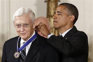 In this May 29, 2012 file photo, President Barack Obama awards the Medal of Freedom to John Doar, who handled civil rights cases in the 1960's, during a ceremony in the East Room of the White House in Washington. Doar, who as a top Justice Department civil rights lawyer in the 1960s fought to protect the rights of black voters and integrate universities in the South, died Tuesday at age 92.