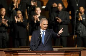 U.S. Attorney General Eric Holder gestures as he speaks to members of the community during an interfaith service at Ebenezer Baptist Church, the church where The Rev. Martin Luther King Jr. preached, Monday, Dec. 1, 2014, in Atlanta. Holder traveled to Atlanta to meet with law enforcement and community leaders for the first in a series of regional meetings around the country. The president asked Holder to set up the meetings in the wake of clashes between protesters and police in Ferguson, Missouri.
