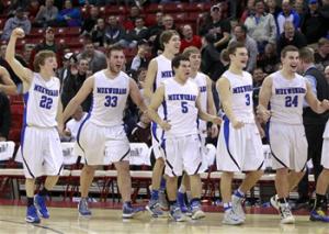 In this March 8, 2013, file photo Mukwonago Indians players celebrate a 64-47 win over Milwaukee King in a Division 1 semifinal WIAA high school basketball game in Madison, Wis. Wisconsin Gov. Scott Walker signed a bill Thursday, Dec 19, 2013, that will make it harder to force public schools to drop tribal nicknames, pushing aside opponents' charges that the measure is racist.