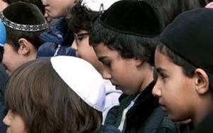 Dozens of Jewish children have been traumatized by a gang of teenagers who stormed a school bus in Sydney, Australia and allegedly hurled racial abuse and threats.