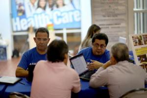 Hispanics account for about one-third of the nation's uninsured, but they seem to be staying on the sidelines as the White House races to meet a goal of 6 million sign-ups by March 31.